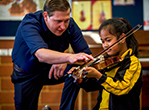 WASO teacher teaching a student