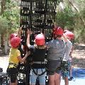 Participants holding crates