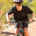 A boy on a bike on the pump track