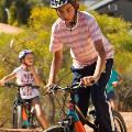 A boy on a bike on the pump track